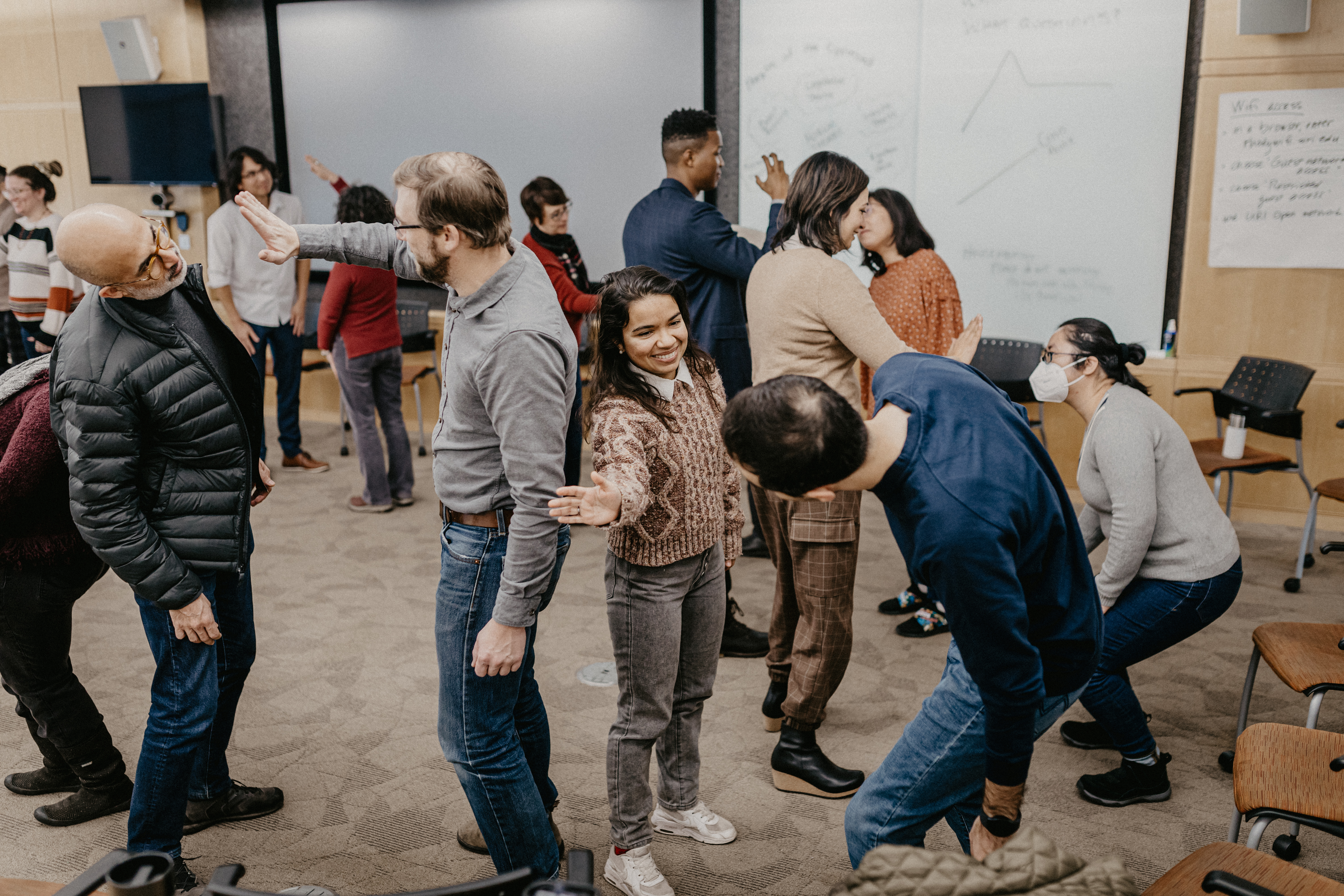 workshop participants play a hypnosis theatre game